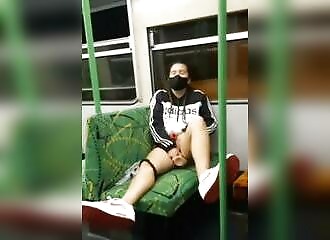 Risky masturbation with a dildo in the subway