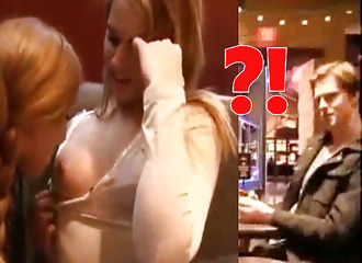 She's sucking on a friend's boob at a restaurant