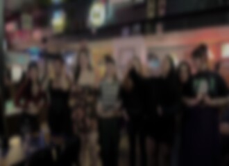 All these girls are showing off their breasts in a bar! 