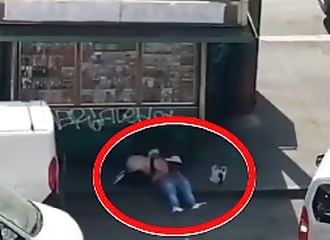 Slut sucks behind a kiosk
